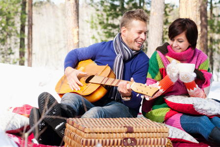 Couple having winter picnic