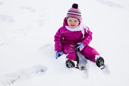 Toddler girl in snow