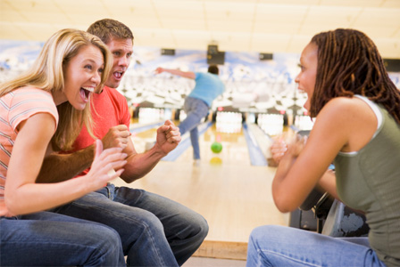 Group of friends bowling