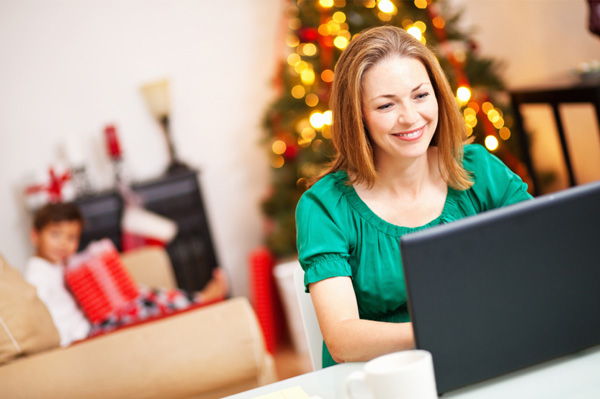 Woman doing Christmas shopping online