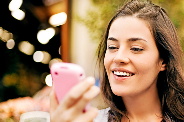 Woman looking at her smartphone